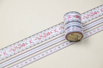 Washi tape set with lilac floral and lace border designs, multiple rolls