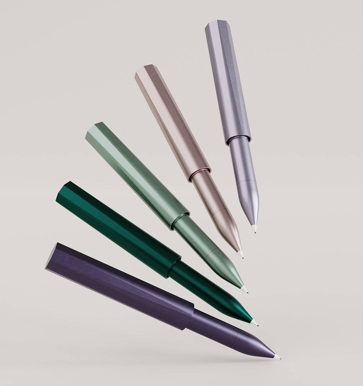 Set of refillable writing pens in assorted colors, capped and uncapped
