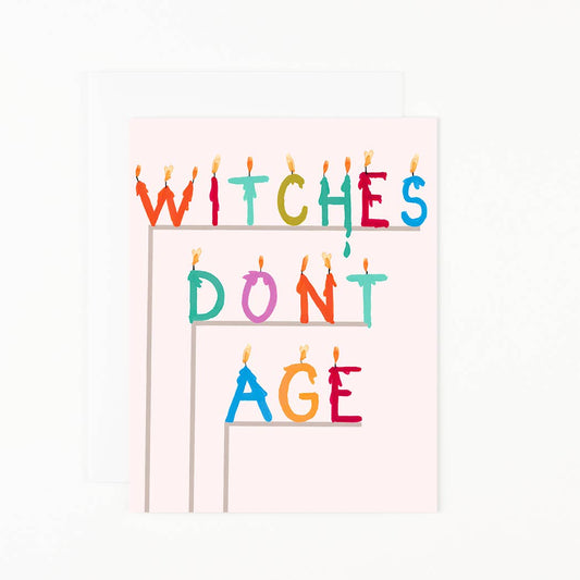 Witches-themed greeting card with candle-style text: WITCHES DON'T AGE