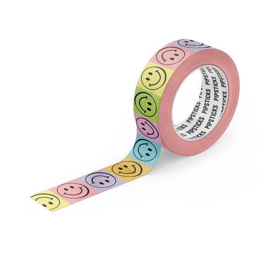Smiley-face tiled washi tape roll with multicolor expressions and patterned paper strip