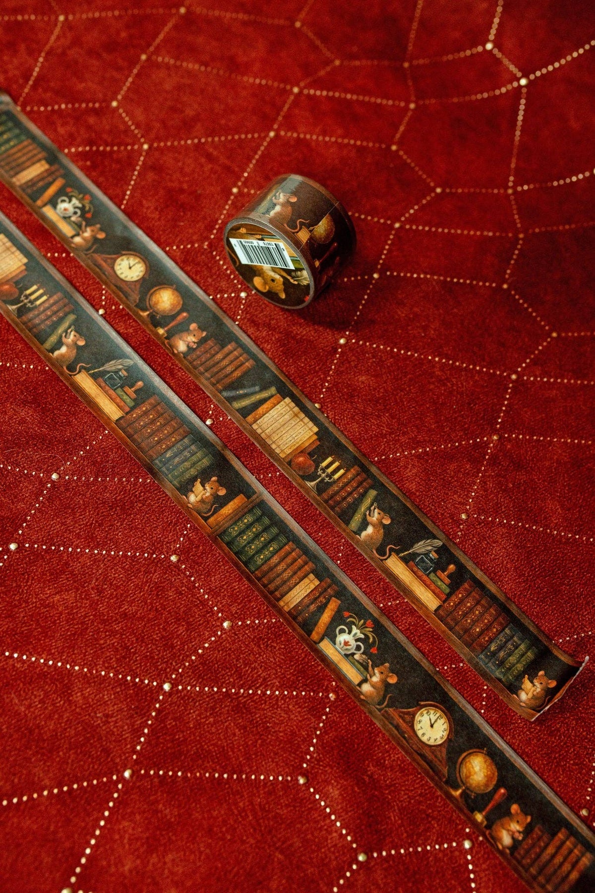 Washi tape strip with vintage shelf and clock design, coiled roll beside it
