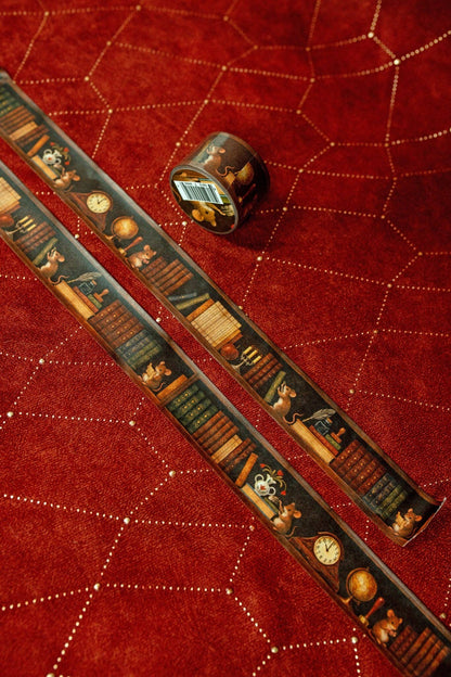 Washi tape strip with vintage shelf and clock design, coiled roll beside it
