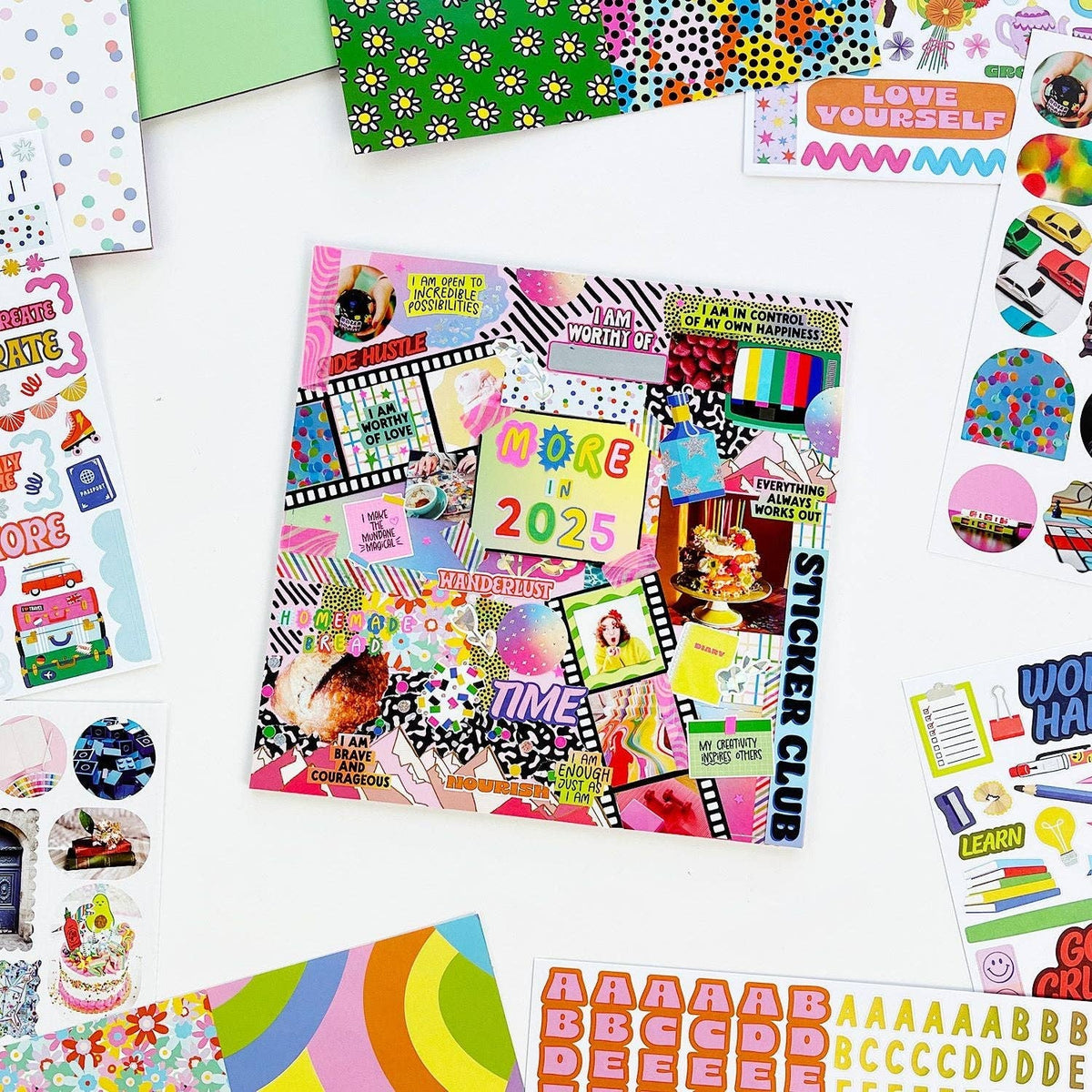 Colorful vision board poster sheet with 2025 theme and motivational stickers
