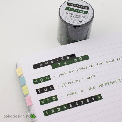 Black and green embossed letters PET tape roll with kiss-cut letter strips