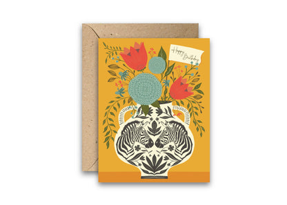 Birthday greeting card with a patterned zebra vase, colorful flowers, and kraft envelope
