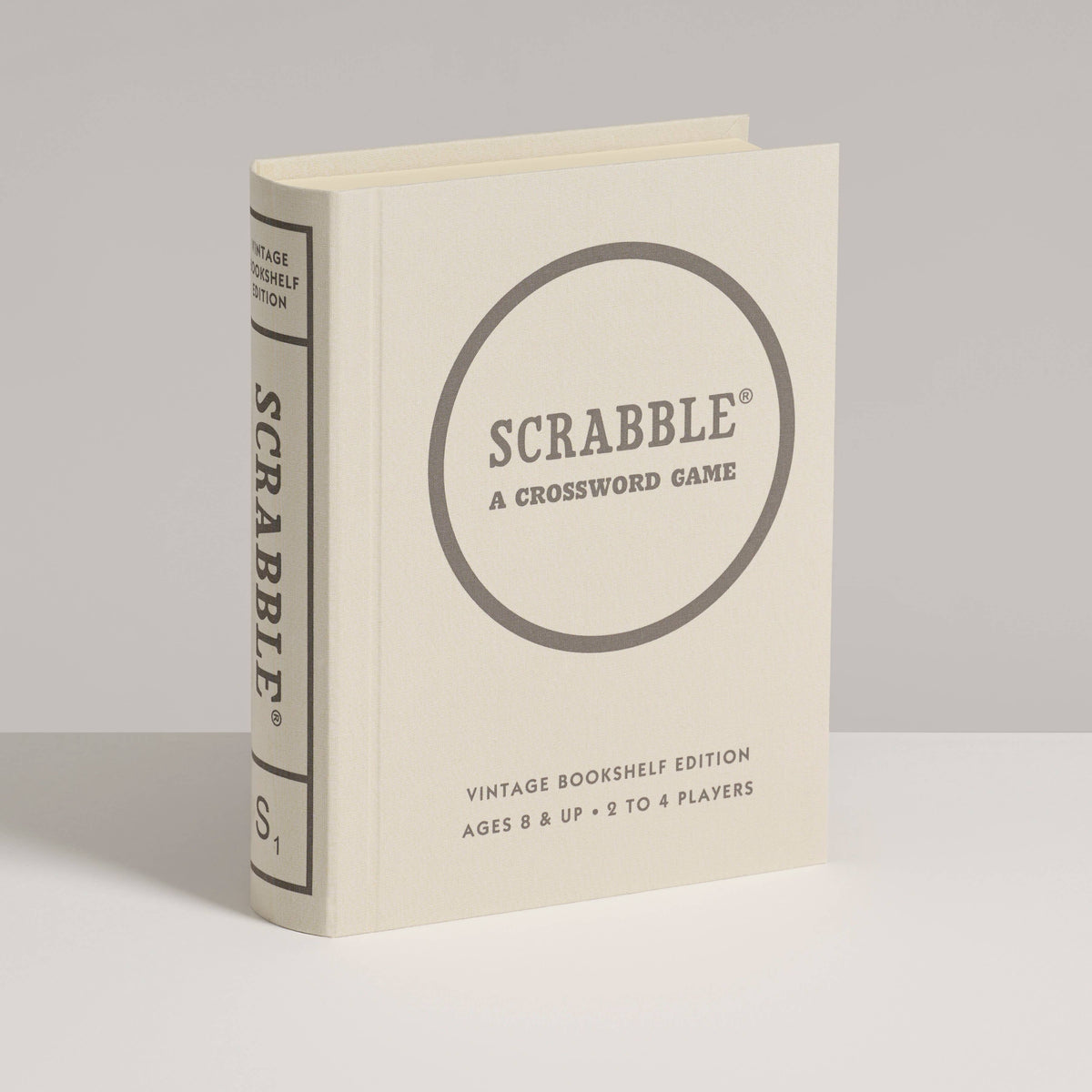 Vintage Scrabble bookshelf edition book, cream cover with circular logo