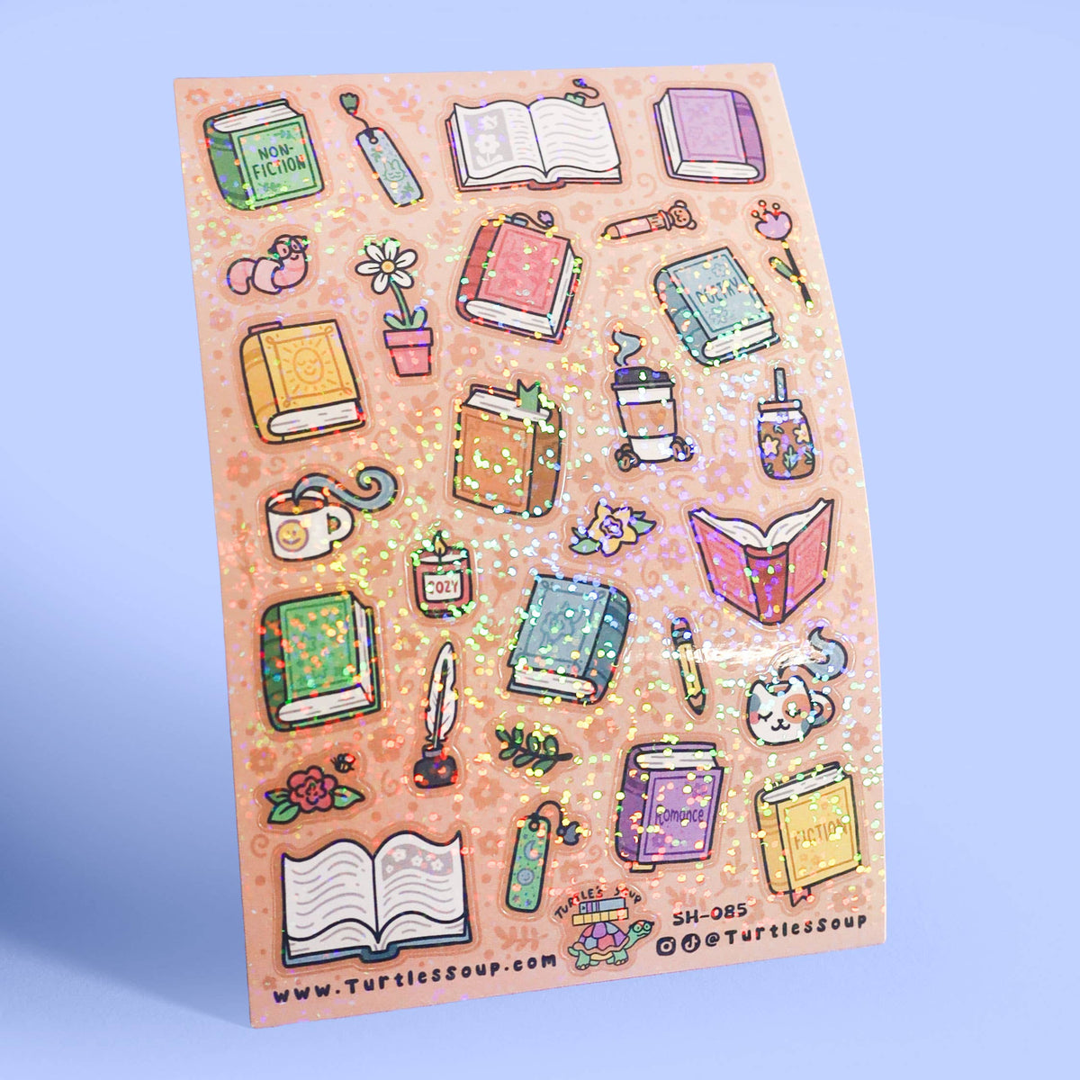 Glitter sticker sheet with sparkle accents, showing books, cups, and stationery