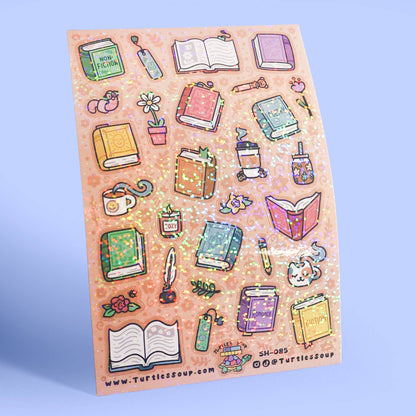 Glitter sticker sheet with sparkle accents, showing books, cups, and stationery