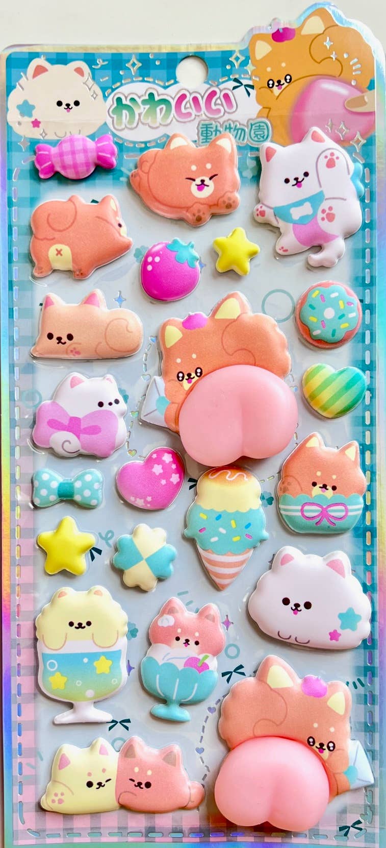 Blue animal squishy butt sticker set with pastel cats, bunnies, stars, and ice cream