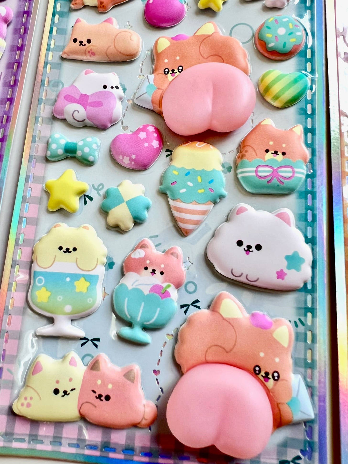 Blue animal squishy butt sticker sheet with pink butt sticker and cloud and star shapes
