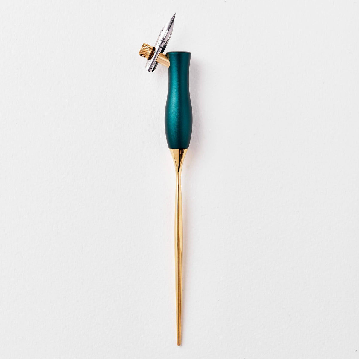 Calligraphy pen with oblique nib, teal handle and gold barrel