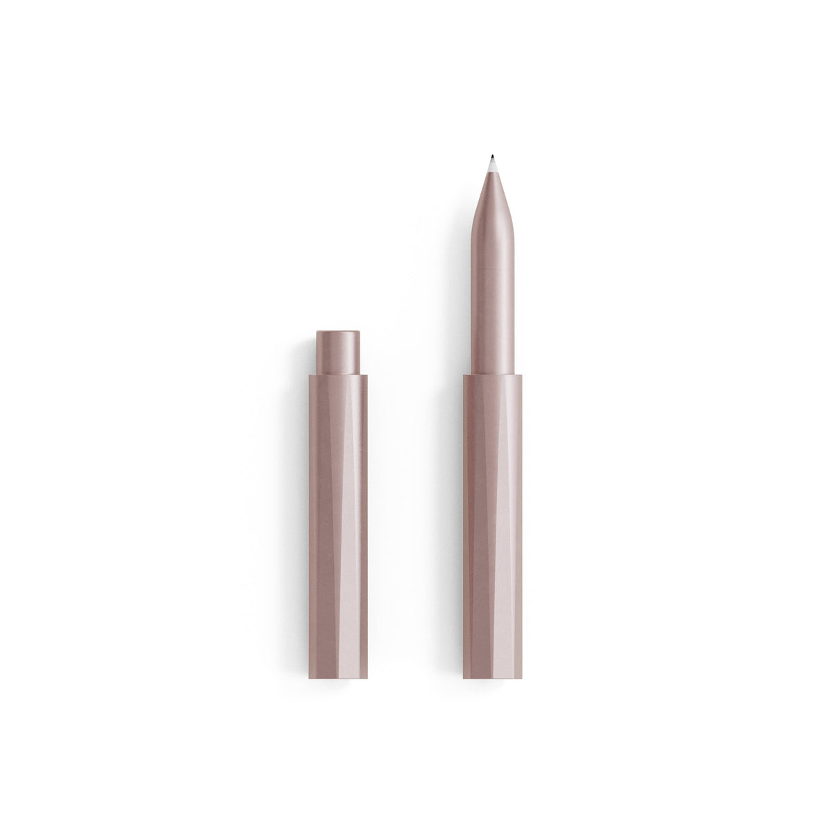 Refillable writing pen, blush pink body with cap and pointed tip