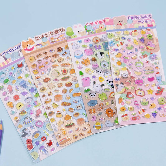 Four sheets of laser glass stickers with cute animal faces and food charms