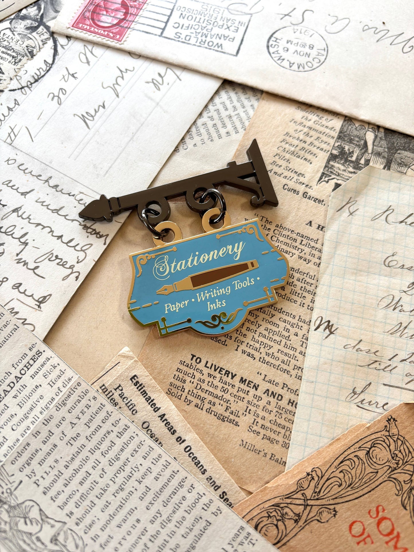 Stationery store shop sign pin