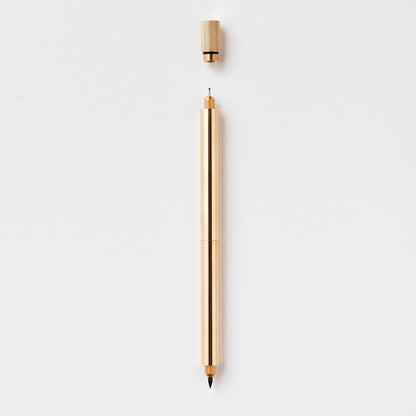 Brass metal pen with pointed nib and end cap