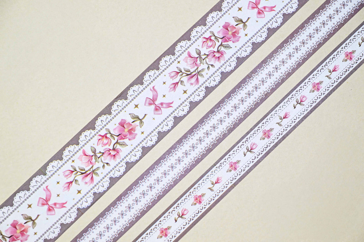 Washi tape strips with lilac lace, pink flowers, and butterfly details