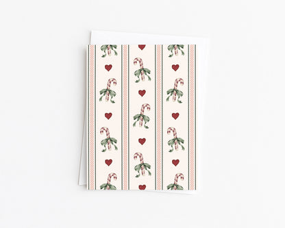 Christmas note card with candy cane bow cross-stitch pattern and red hearts