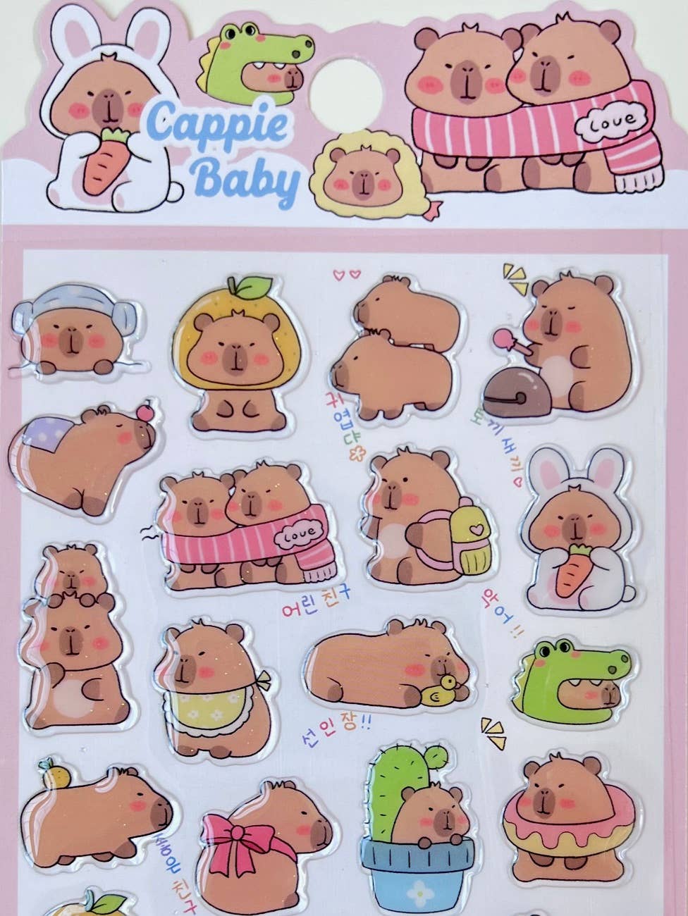 Capybara Baby sticker sheet with transparent-backed capybara and rabbit cutouts