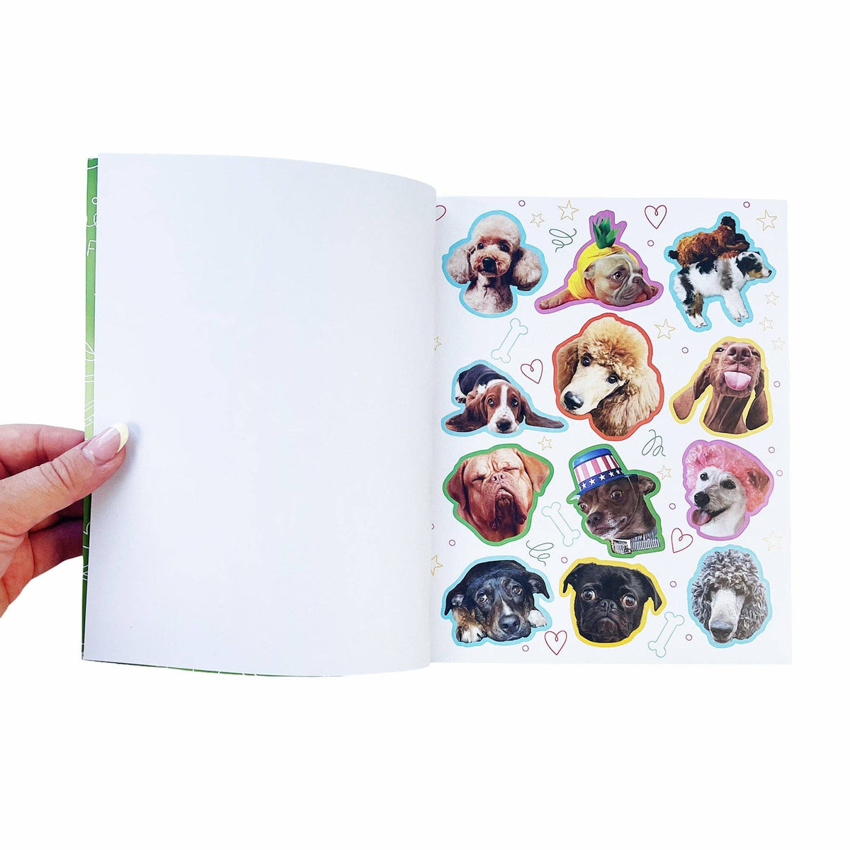 Open dog sticker book page with colorful dog sticker cutouts on the right
