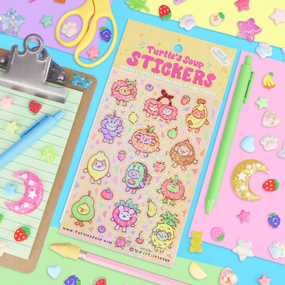 Glitter sticker sheet with cute fruit-animal designs and bold sticker outlines