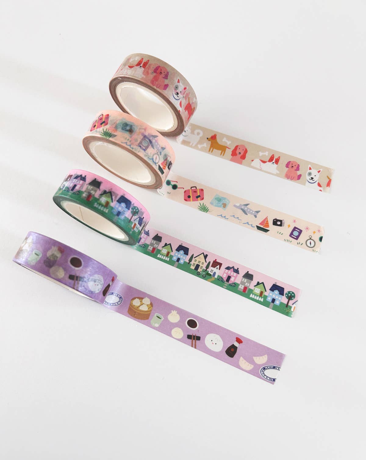 Set of paws washi tape rolls with colorful pet-themed strips