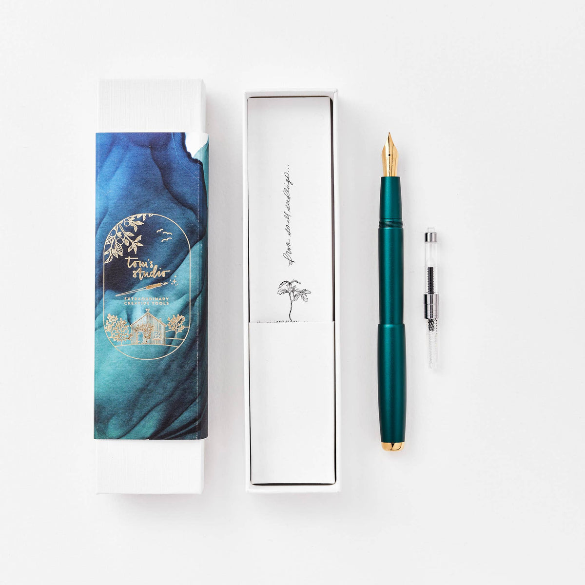 Teal green fountain pen with gold nib, gift box set with spare cartridge