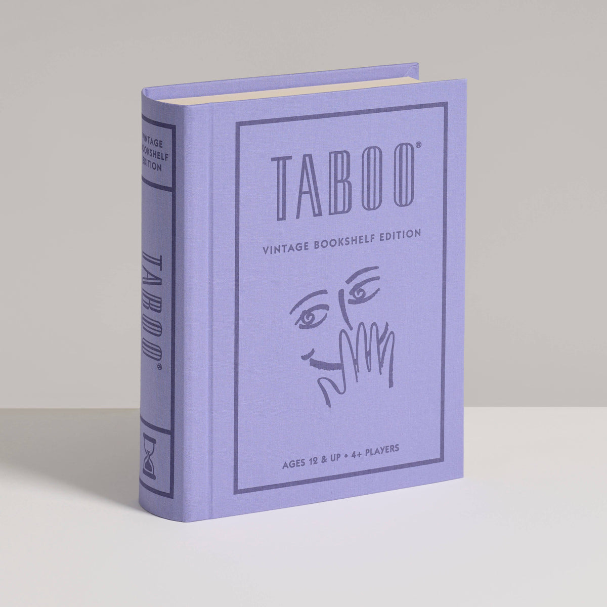 Vintage bookshelf edition game box with bold lettering and abstract face/hand graphic