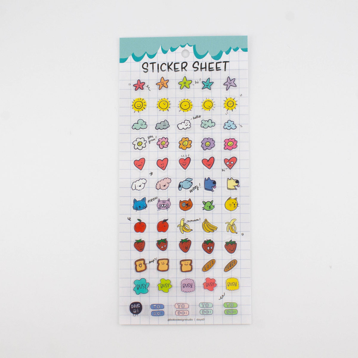 Clear sticker sheet with mixed icons: stars, suns, flowers, hearts, and animals