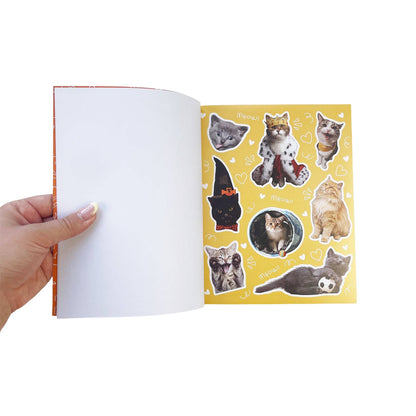 Cat sticker book opened page with white blank area and yellow sheet of cat stickers