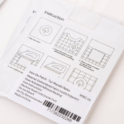 Iron-on patch instruction sheet with step-by-step diagrams and barcode