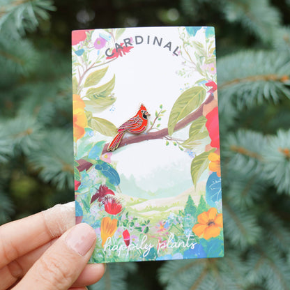 Floral bird gift card featuring a red cardinal illustration