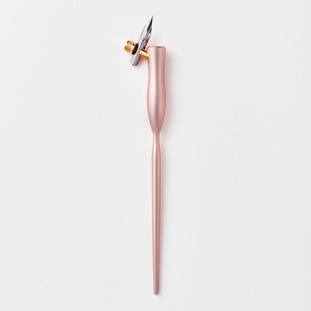 Flourish calligraphy pen with rose-pink body and gold nib