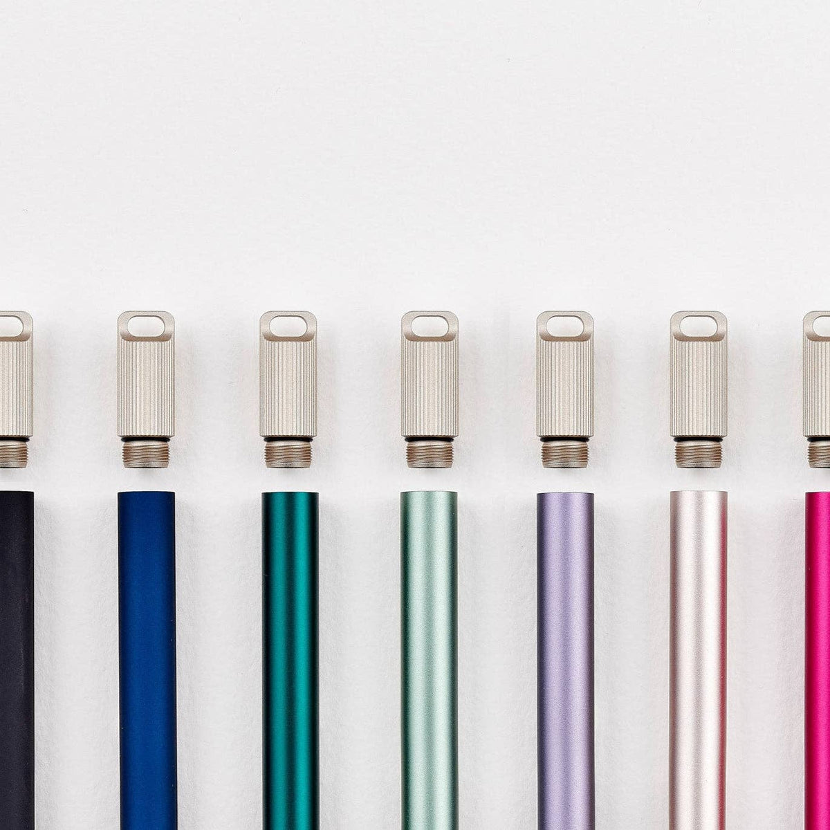 Set of colored keychain pen bodies with metal caps and keyring loops