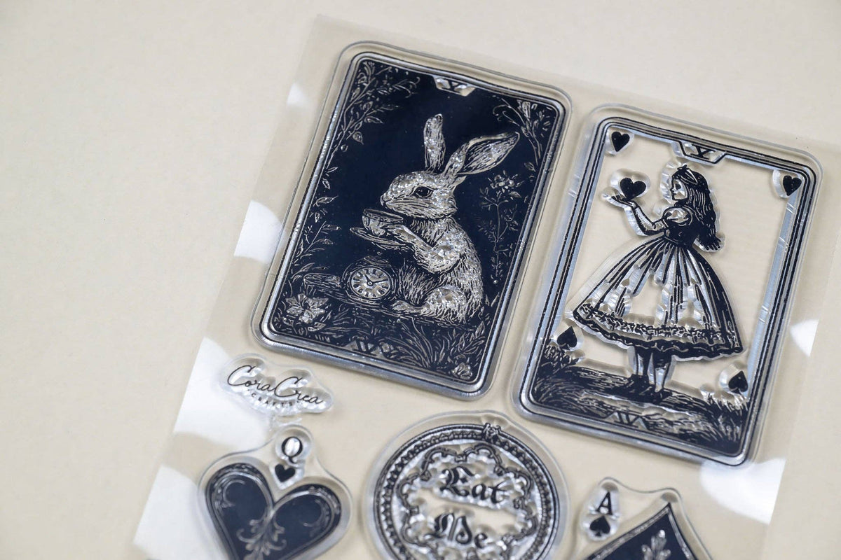 Clear stamp sheet featuring rabbit and girl-in-dress motifs with card and charm icons