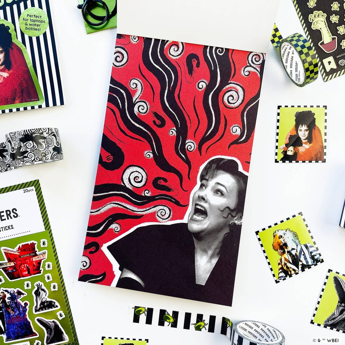 Red-and-black sticker sheet with swirling pattern and a grayscale woman portrait